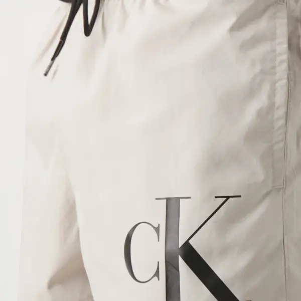 Calvin Klein - Ανδρικό Μαγιό Σορτς Μεσαίου Μήκους Με Κορδόνι KM0KM00967-PE0 Μπέζ