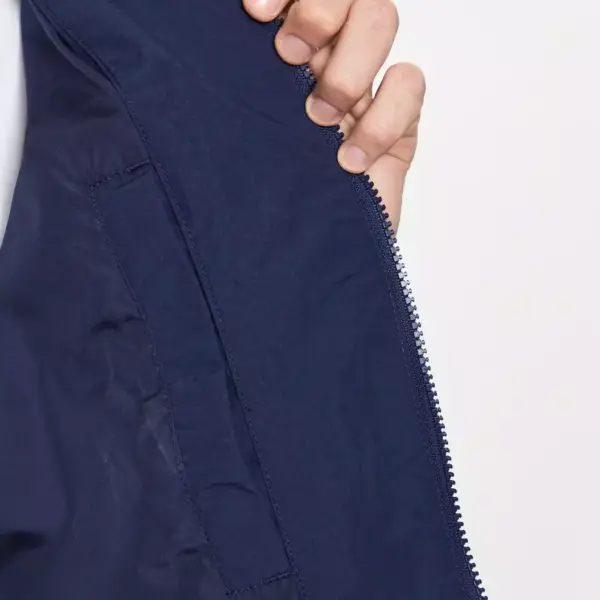 Tommy Hilfiger - Ανδρικό Μπουφάν Αντιανεμικό DM0DM15916-C87 Μπλε Ναυτικό DM0DM15916-C87