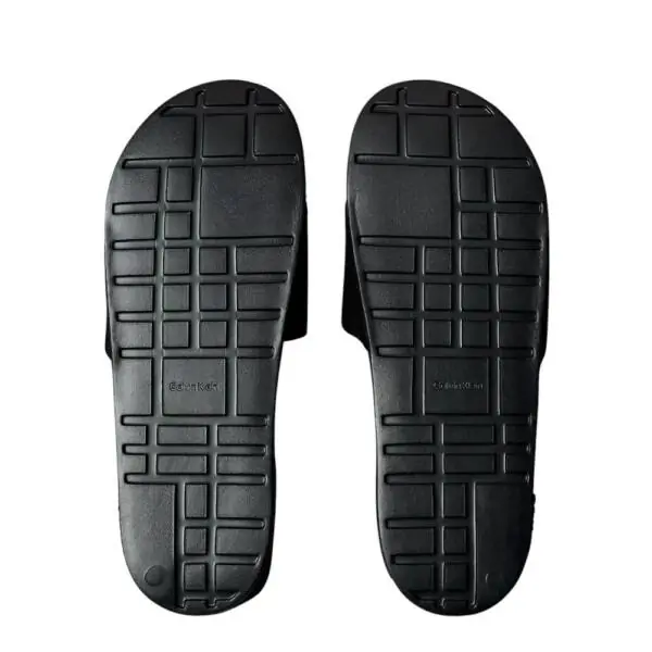 Calvin Klein - Ανδρικές Παντόφλες Slide Canvas Logo YM0YM01393-0GJ Μαύρο YM0YM01393-0GJ