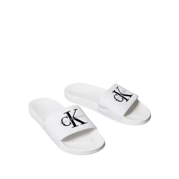 Calvin Klein - Ανδρικές Παντόφλες Slide Canvas Logo YM0YM01393-0K4 Λευκό YM0YM01393-0K4