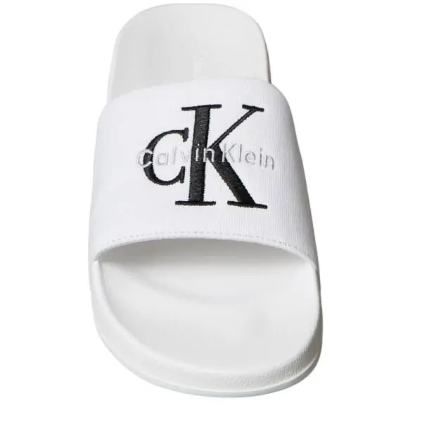 Calvin Klein - Ανδρικές Παντόφλες Slide Canvas Logo YM0YM01393-0K4 Λευκό YM0YM01393-0K4