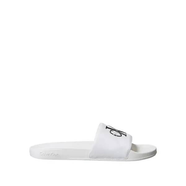 Calvin Klein - Ανδρικές Παντόφλες Slide Canvas Logo YM0YM01393-0K4 Λευκό