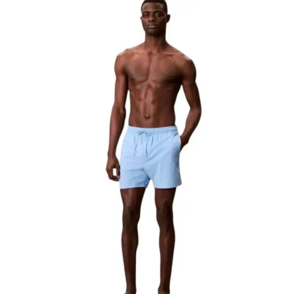 Calvin Klein - Ανδρικό Μαγιό Σορτς Core Solid LV00N61002-5F8 Γαλάζιο LV00N61002-5F8
