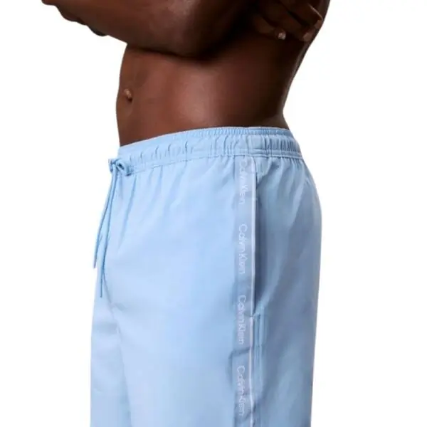 Calvin Klein - Ανδρικό Μαγιό Σορτς Core Solid LV00N61002-5F8 Γαλάζιο LV00N61002-5F8