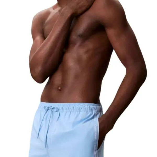 Calvin Klein - Ανδρικό Μαγιό Σορτς Core Solid LV00N61002-5F8 Γαλάζιο LV00N61002-5F8