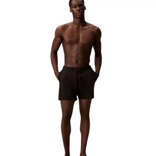 Calvin Klein - Ανδρικό Μαγιό Σορτς Core Solid LV00N61002-UB1 Μαύρο LV00N61002-UB1