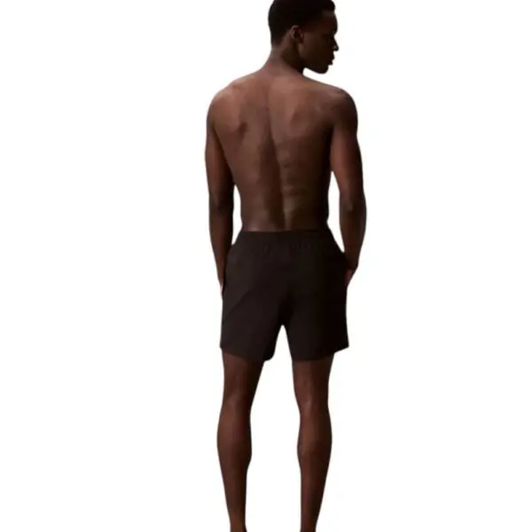 Calvin Klein - Ανδρικό Μαγιό Σορτς Core Solid LV00N61002-UB1 Μαύρο LV00N61002-UB1